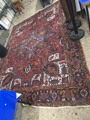 Lot 356 - A patterned rug 12x8.5ft