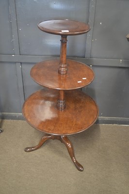 Lot 346 - A Georgian mahogany three tier dumb waiter,...