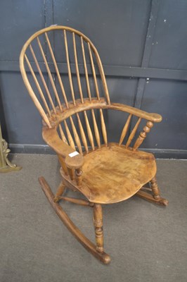 Lot 358 - A 20th Century elm and ash rocking chair with...