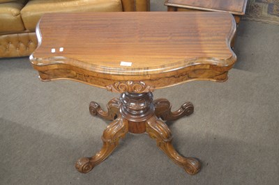 Lot 372 - A Victorian walnut card table, the folding...