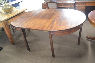 Lot 375 - A Georgian mahogany D end dining table with...