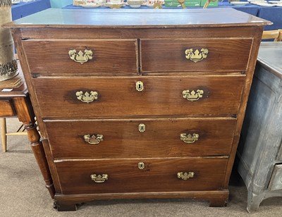 Lot 406 - A Georgian oak chest of two short over three...