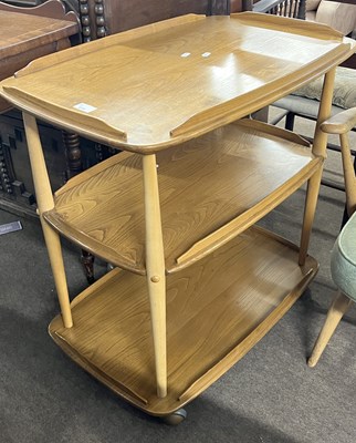Lot 416 - An Ercol light elm tea trolley, 71cm wide