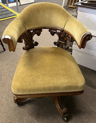 Lot 423 - A large Victorian velvet upholstered revolving...