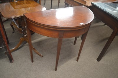 Lot 441 - A Georgian mahogany D shaped tea table with...