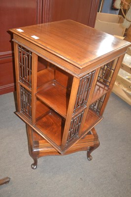 Lot 452 - An Edwardian mahogany revolving bookcase of...