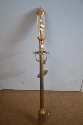 Lot 459 - A 20th Century brass marine stick barometer...