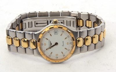 Lot 184 - A ladies Longines Conquest watch with box,...