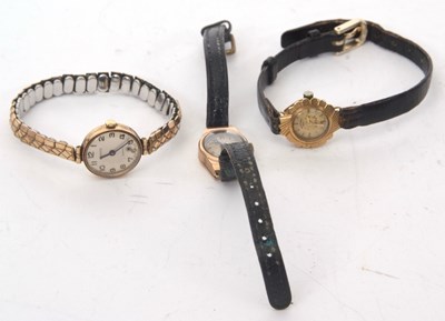 Lot 187 - Mixed Lot: Three yellow metal ladies watches,...