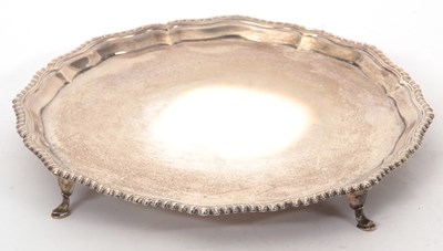 Lot 64 - An Edwardian silver salver of shaped circular...