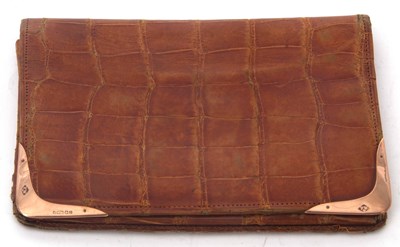 Lot 118 - An antique crocodile skin wallet with two 9ct...