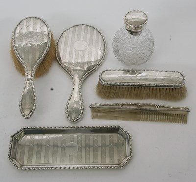 Lot 121 - An Edwardian silver six piece dressing table...