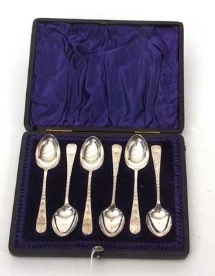 Lot 138 - A cased set of six silver bright cut decorated...