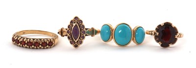 Lot 76 - Four gemset rings: to include a three stone...