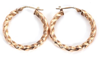 Lot 170 - A pair of 9ct earrings, the twisted hoops 32mm...