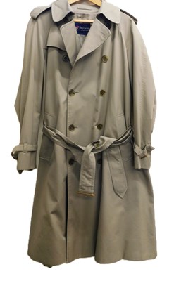 Lot 212 - A gentleman's double breasted trench coat by...