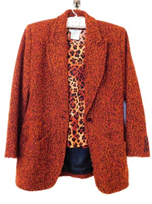 Lot 62 - Yves Saint Laurent: an orange mix jacket with...