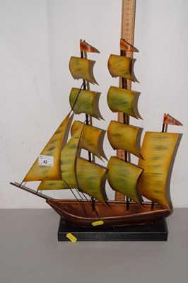Lot 42 - A painted metal model of a tall ship