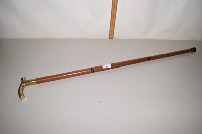 Lot 50 - A brass handled walking stick