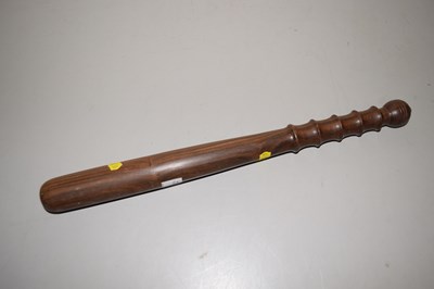 Lot 62 - A turned wooden truncheon