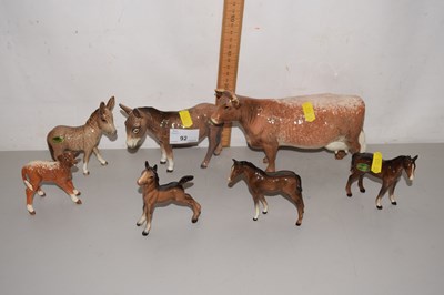 Lot 92 - A group of Beswick donkies, cattle and foals