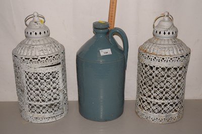 Lot 134 - A pair of metal candle lanterns and an...