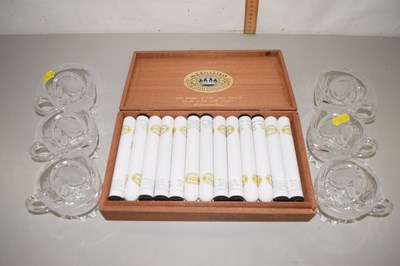 Lot 178 - A medallion cigar case containing a large...