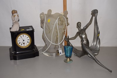 Lot 206 - A Victorian mantel clock in ebonised wooden...