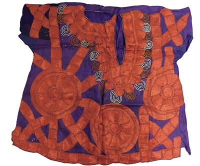 Lot 165 - An early 20th century embroidered girls tunic...