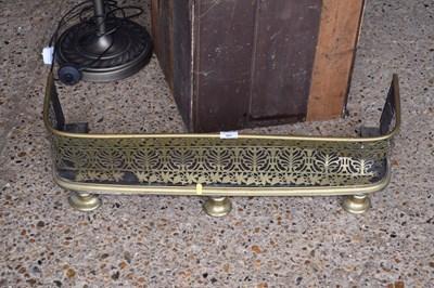 Lot 307 - A small 19th Century pierced brass fire fender