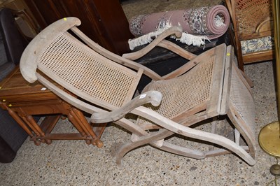 Lot 318 - Late 19th/early 20th Century teak and cane...