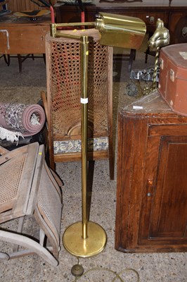 Lot 319 - A brass adjustable floor standing reading light