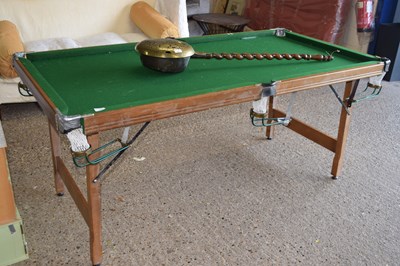 Lot 324 - A small snooker or pool table with folding base