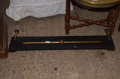 Lot 345 - A brass and iron fire curb