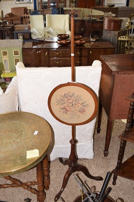 Lot 347 - A 19th Century pole screen decorated with a...