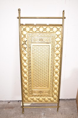 Lot 362 - A pressed brass panel
