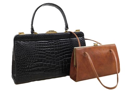Lot 118 - A black leather faux crocodile leather handbag,...