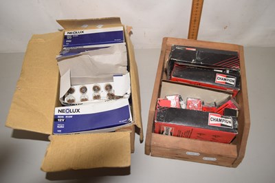 Lot 618 - Box of Champion spark plugs and a box of 12v...