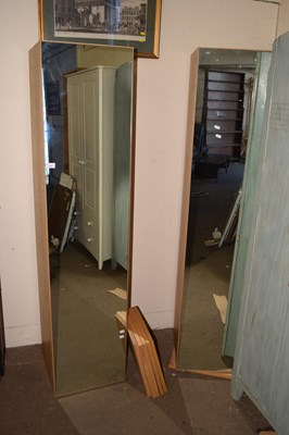 Lot 745 - A pair of mirrored wardrobes
