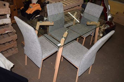 Lot 753 - Modern glass top dining table and four chairs