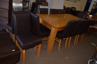 Lot 807 - Modern oak dining table and eight chairs