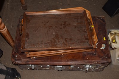 Lot 812 - A vintage leather suitcase and wooden serving...