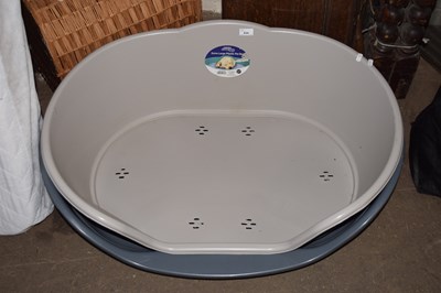 Lot 838 - Two plastic dog beds