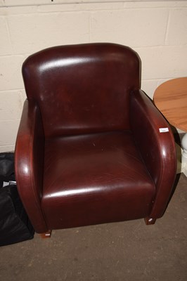 Lot 844 - A red leather chair