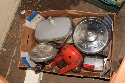 Lot 847 - Box of various headlamps, Volvo hub caps etc
