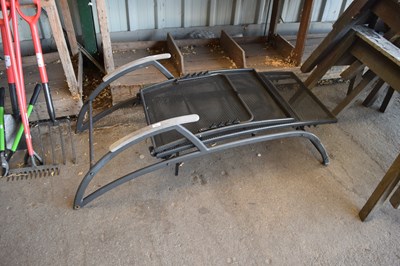 Lot 365 - A metal folding sun lounger