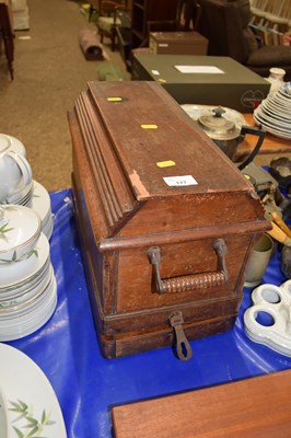 Lot 177 - A Singer sewing machine in wooden housing