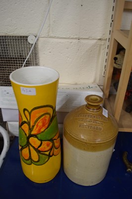 Lot 43A - A stoneware bottle together with a Poole...