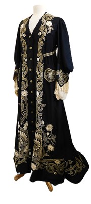 Lot 4 - An early 1900's lady's coat/dress, with V-neck...