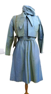 Lot 46 - A 1980's lady's suit, in blue-green shot silk,...